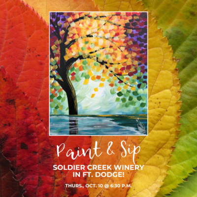 Flyer for a 'Paint & Sip' event at Soldier Creek Winery in Fort Dodge. The background features vibrant, overlapping autumn leaves in shades of red, orange, yellow, and green. In the center, a framed image of the painting 'Fall Reflections' shows a large tree with colorful fall foliage, its branches arching over a reflective body of water. Below the painting, white text reads: 'Paint & Sip, Soldier Creek Winery in Ft. Dodge! Thurs., Oct. 10 @ 6:30 P.M.' The design evokes a warm, autumnal atmosphere, inviting guests to enjoy a creative evening at the winery.