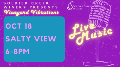 Promotional flyer for Soldier Creek Winery's 'Vineyard Vibrations' event. The flyer features a vintage microphone on the right with glowing text 'Live Music' written in neon-style. The event details are on the left in a blue box, reading: 'OCT 18, Salty View, 6-8 PM.' The background is a vibrant purple with subtle texture, and the Soldier Creek Winery logo is displayed in the top right corner.