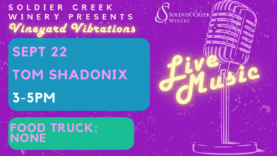 Promotional flyer for Soldier Creek Winery's Vineyard Vibrations event. The background is a bright neon purple with speckled textures. The title at the top reads 'Soldier Creek Winery Presents Vineyard Vibrations' in white and yellow neon-style fonts. Event details are displayed in bright pink and blue blocks: 'Sept 22', 'Tom Shadonix', and '3-5 PM'. At the bottom, a green block with pink text reads 'Food Truck: None'. On the right side, a neon-style microphone illustration glows in yellow with the words 'Live Music' beside it. The Soldier Creek Winery logo appears in the top right corner.